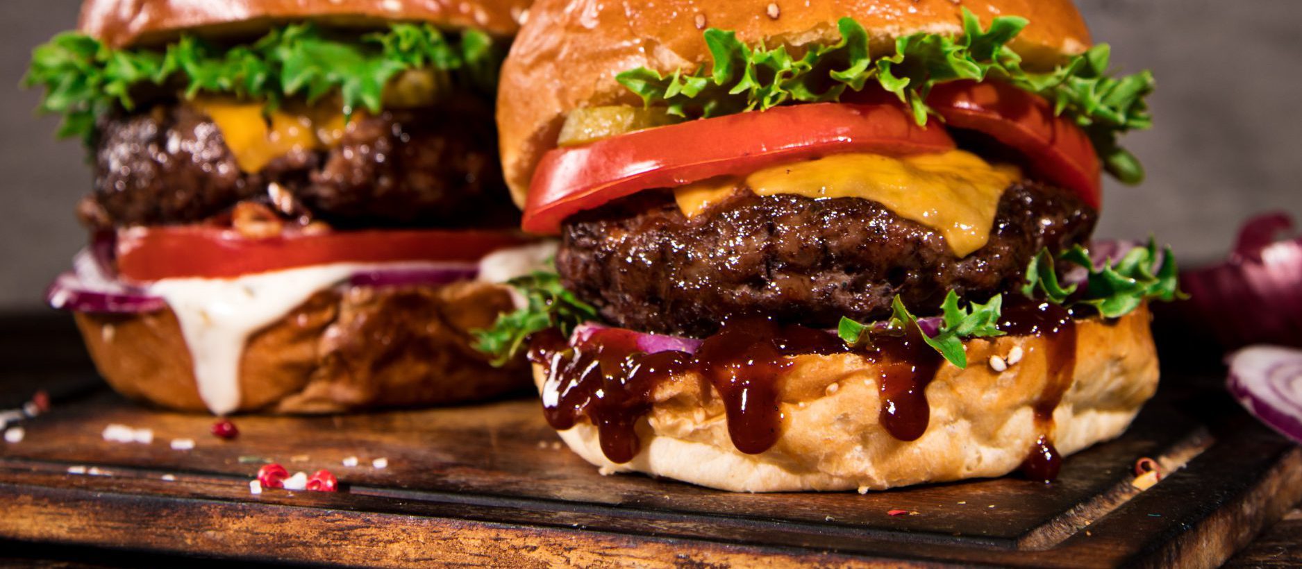 Close-up,Of,Home,Made,Tasty,Burgers,On,Wooden,Table.